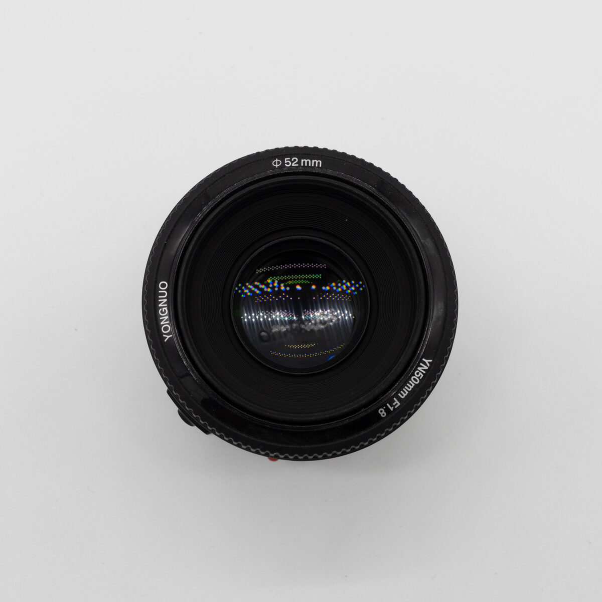 Yongnuo YN50mm F1.8 — vista frontal del elemento óptico (pieza real en venta)